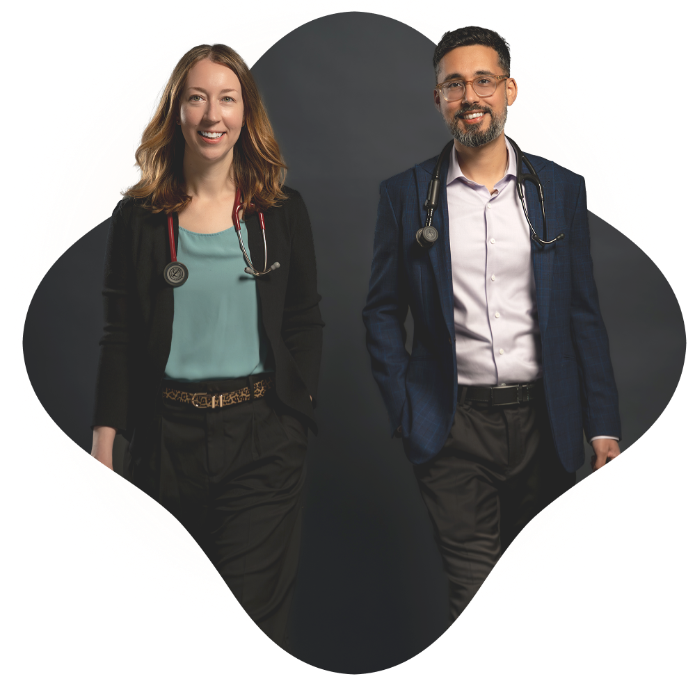 Variant12-1 Two doctors, a woman and a man in business attire with stethoscopes, stand side by side and smile against a dark background with a rounded frame, representing the professionalism found at Lutanen Health Locations.